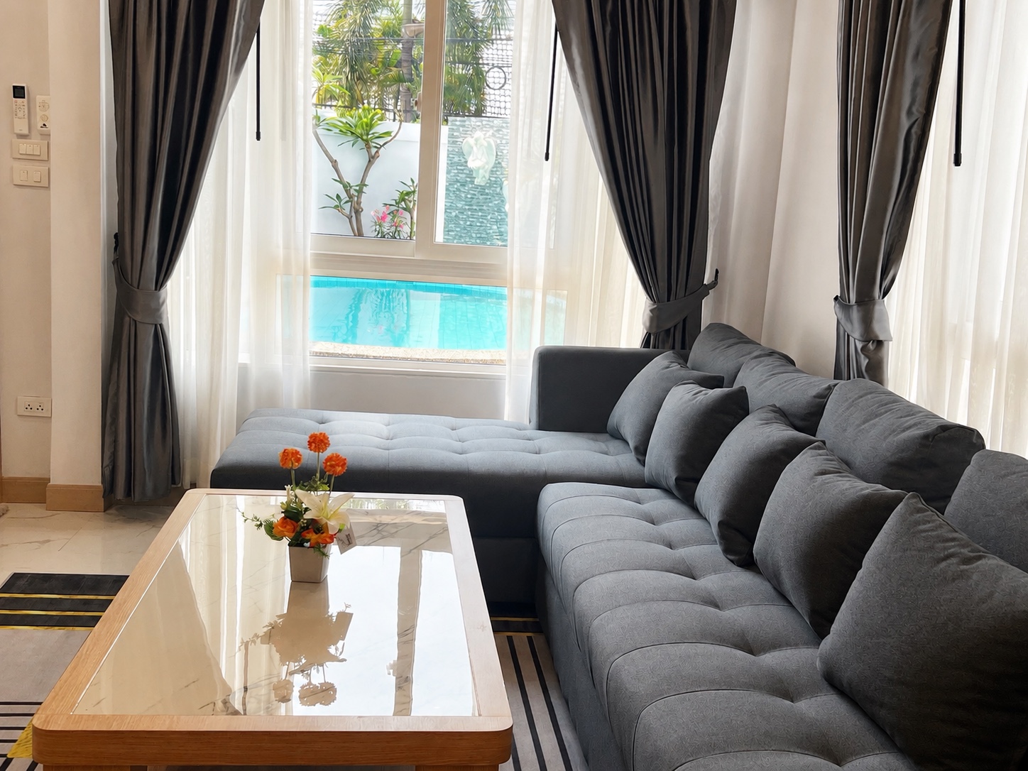 Living room overlooking the private pool