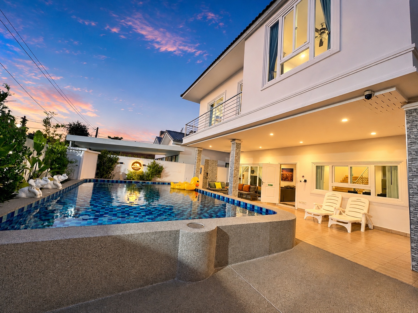 CityHouse 54 large private pool villa at sunset